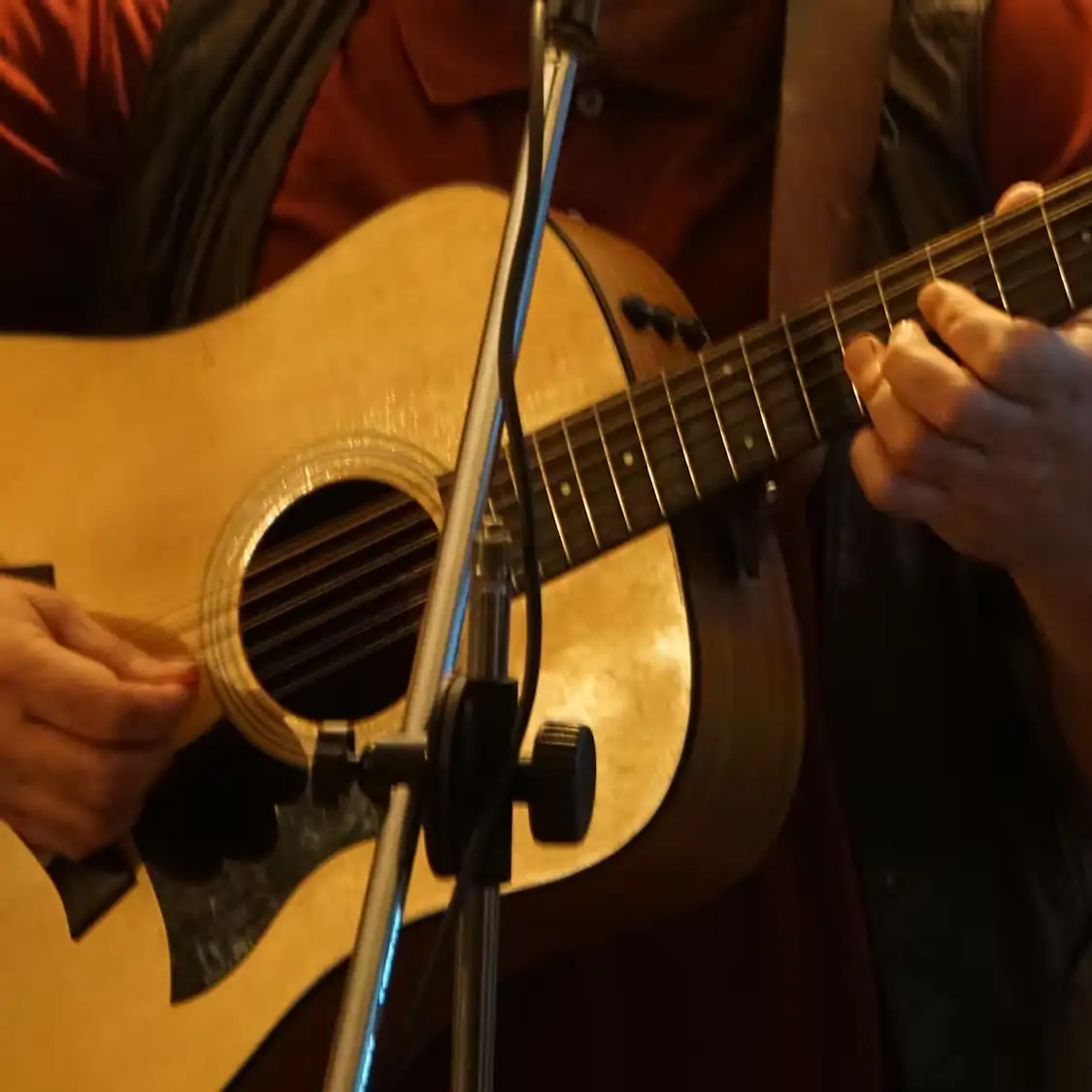 Events button image A guitarist playing